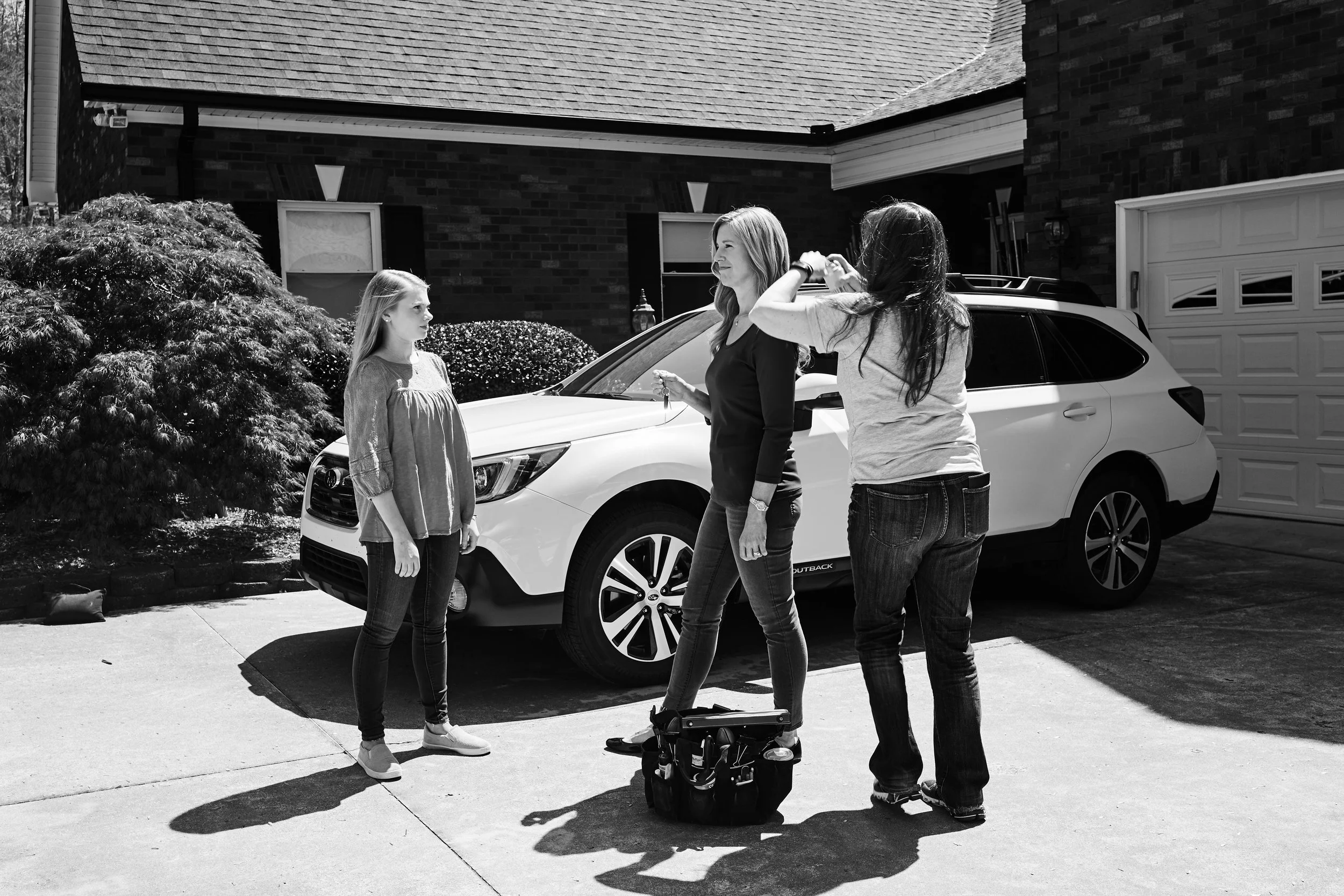 Sandi the double threat getting last looks for models before shooting.