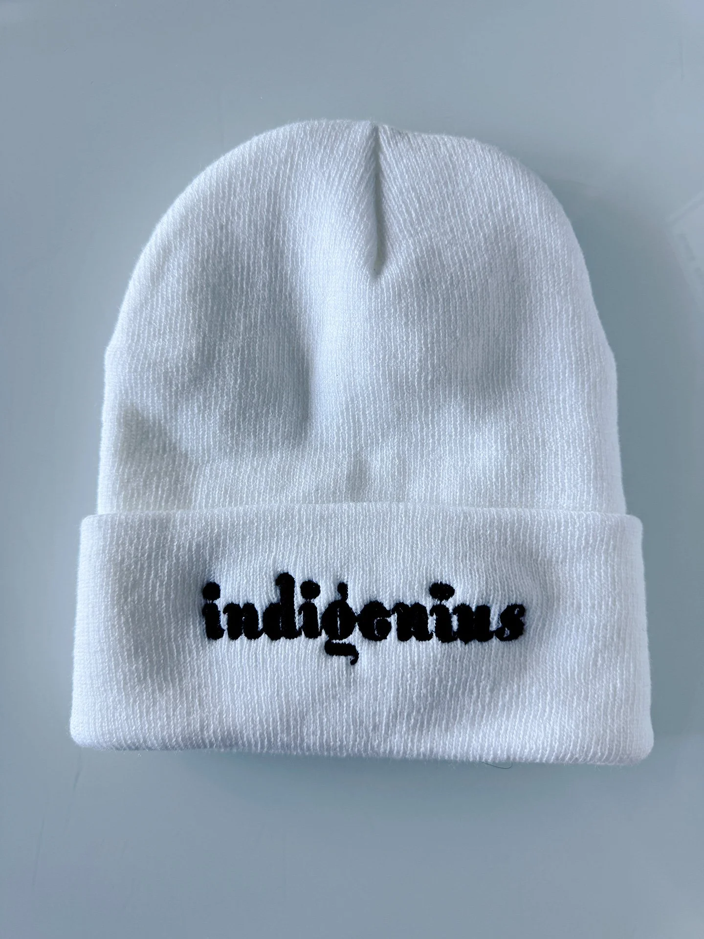 Geraluz-IndiGenius-beannies-2025-White_blkLetters.jpg