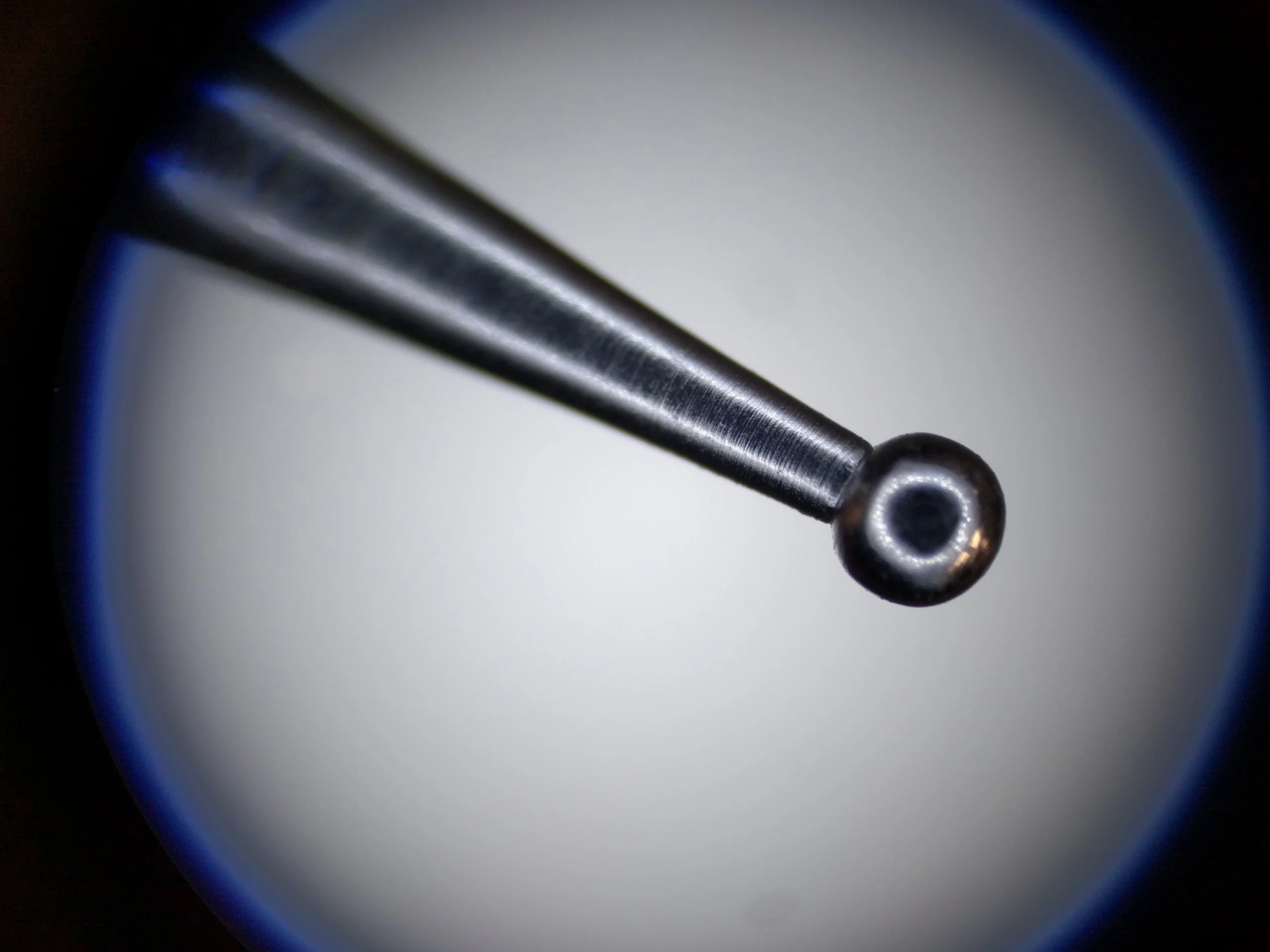 The stylus, 0.075" in diameter.