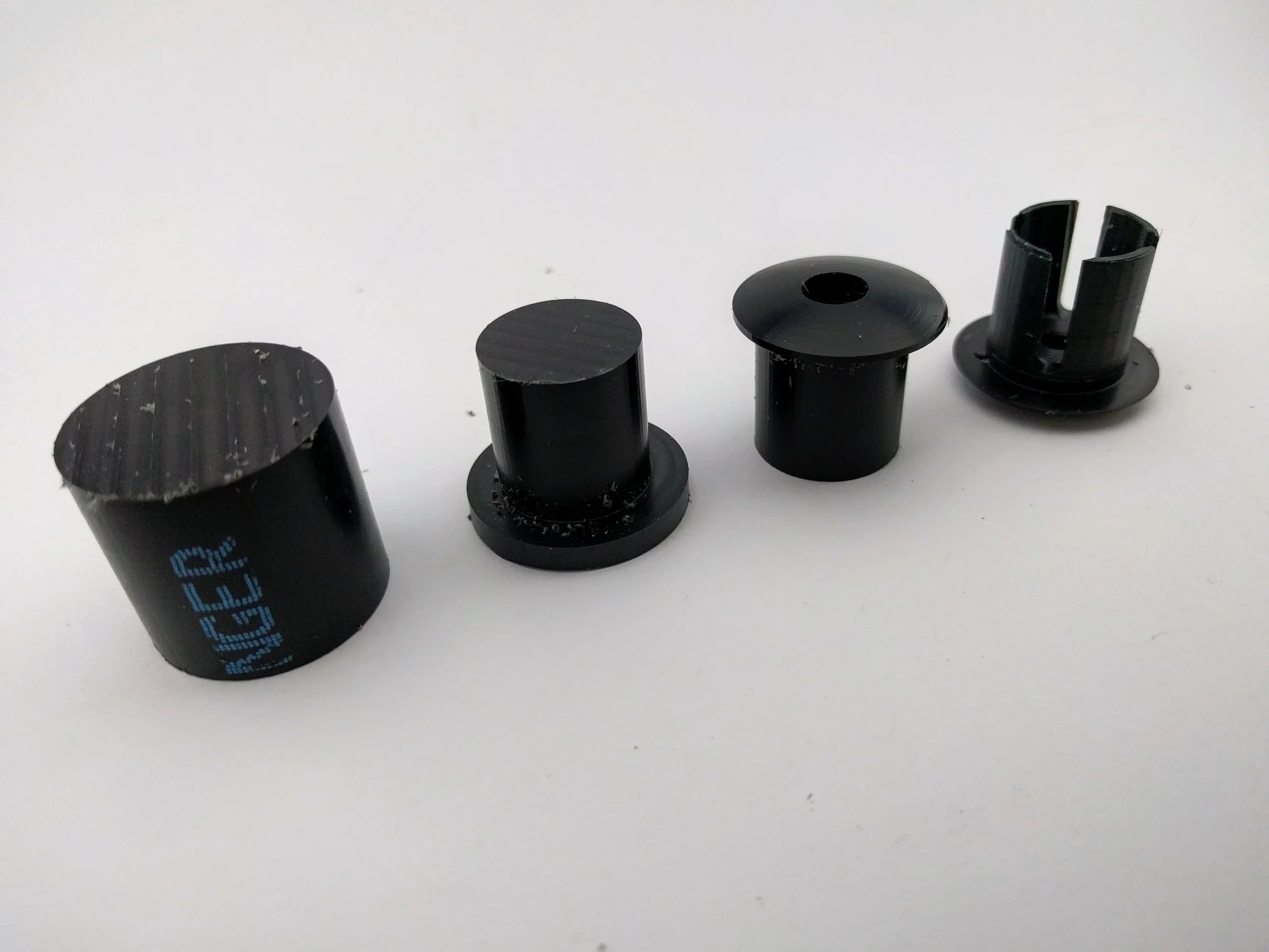 The process, with each piece sitting in the orientation it's milled in. From left to right: Facing, Op1, Op2, and Op3.