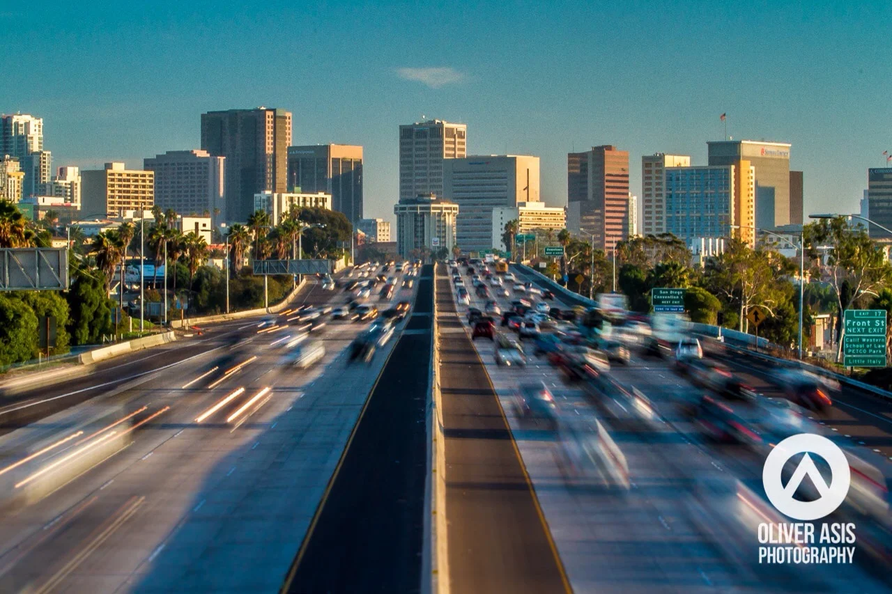 Interstate 5 traffic moves in and out of downtown San Diego during rush hour.