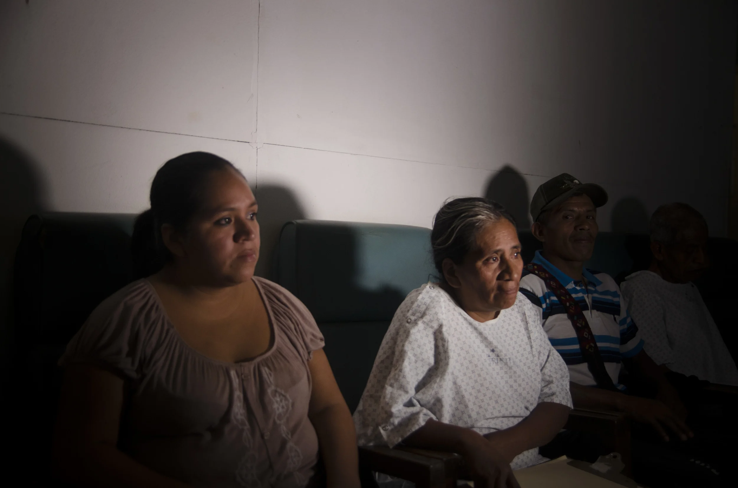  Florinda Garcia, 42, waits in the hospital, having traveled over an hour from her home to the clinic in Chocolá with severe pain in her abdomen. An examination found that the pain was caused by gallstones, an ailment that would require Garcia to und