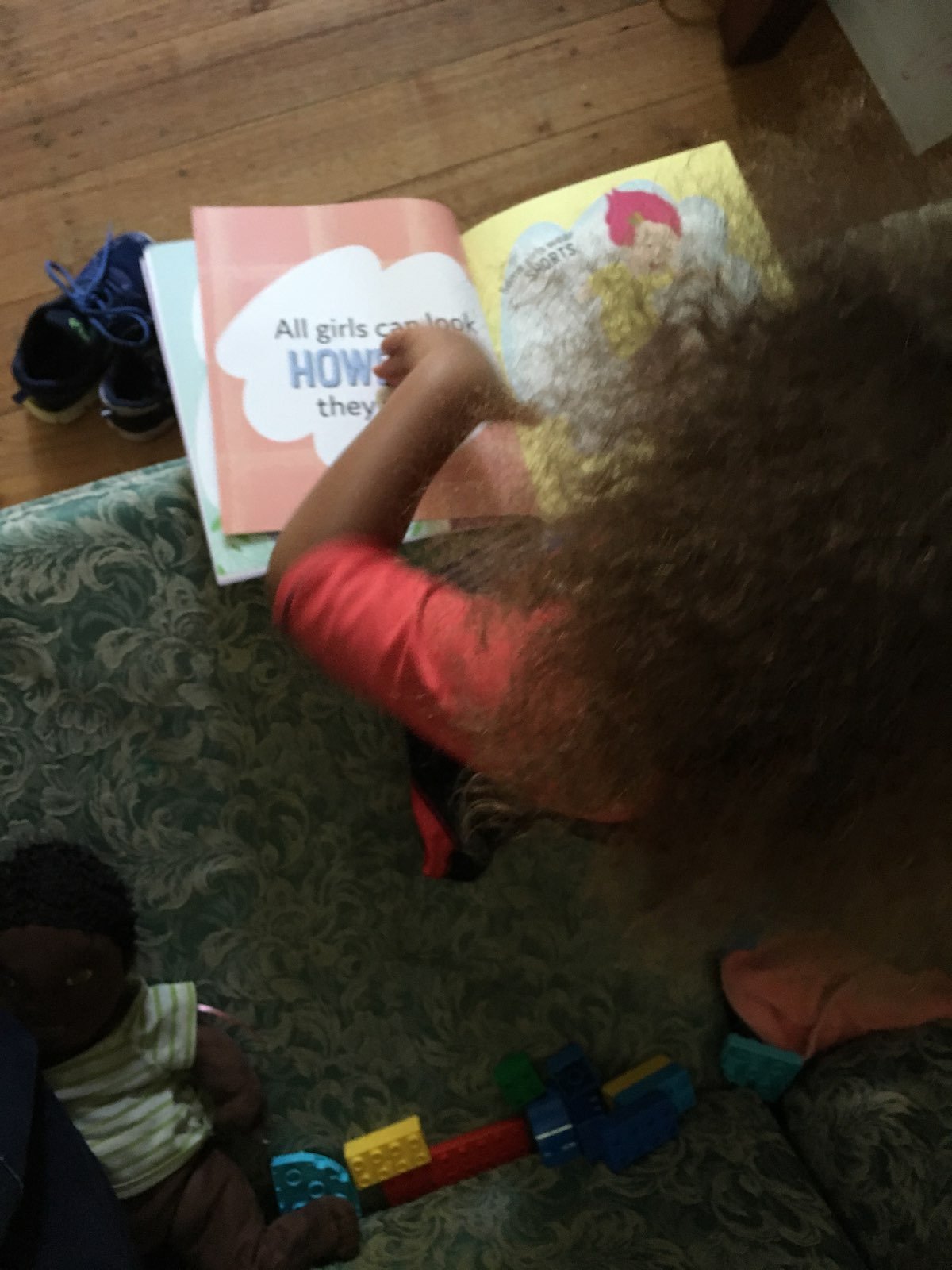 Boy reading SOME GIRLS.JPG