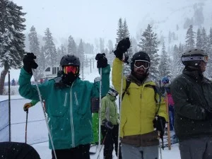 The lucky ones eagerly waiting to ski freshly groomed groomers.