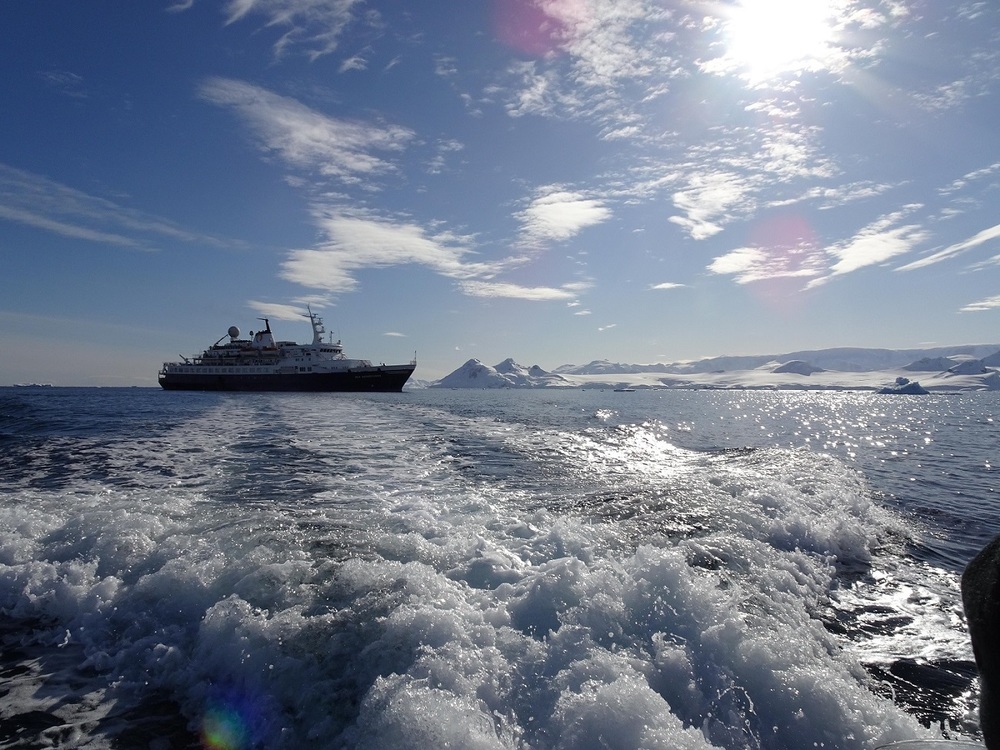 Our Boat in the Unquestionable Beauty of Antarctica.