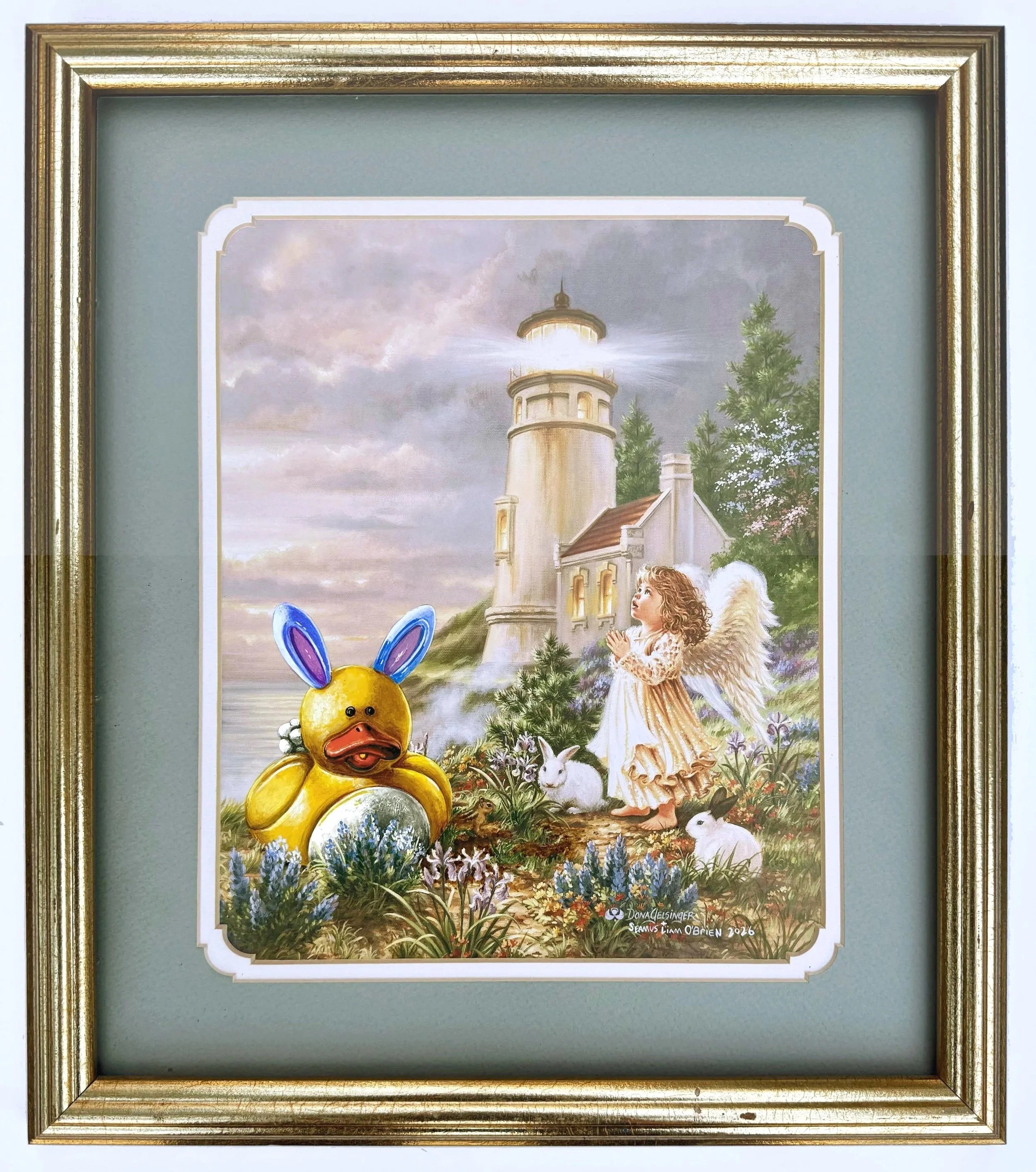 Framed painting of a yellow rubber duck wearing rabbit ears in front of a lighthouse next to a white angel girl.