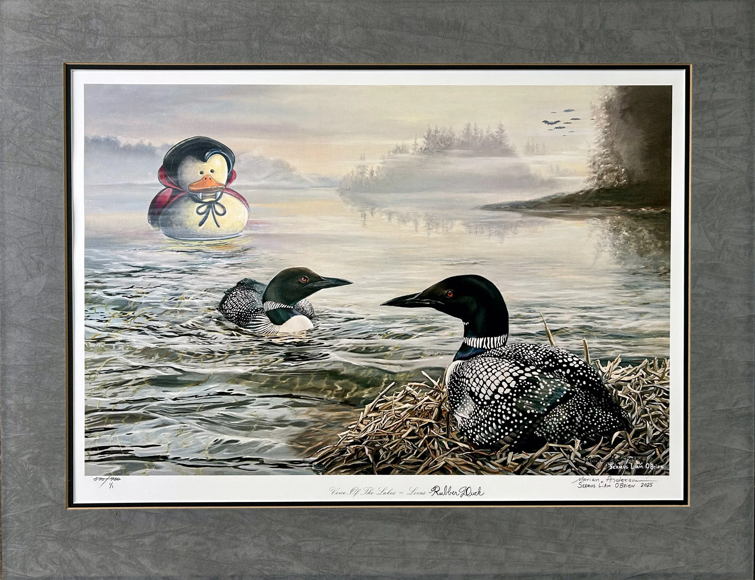 Painting of a vampire-themed rubber duck floating in a lake behind two loon birds nesting in the foreground