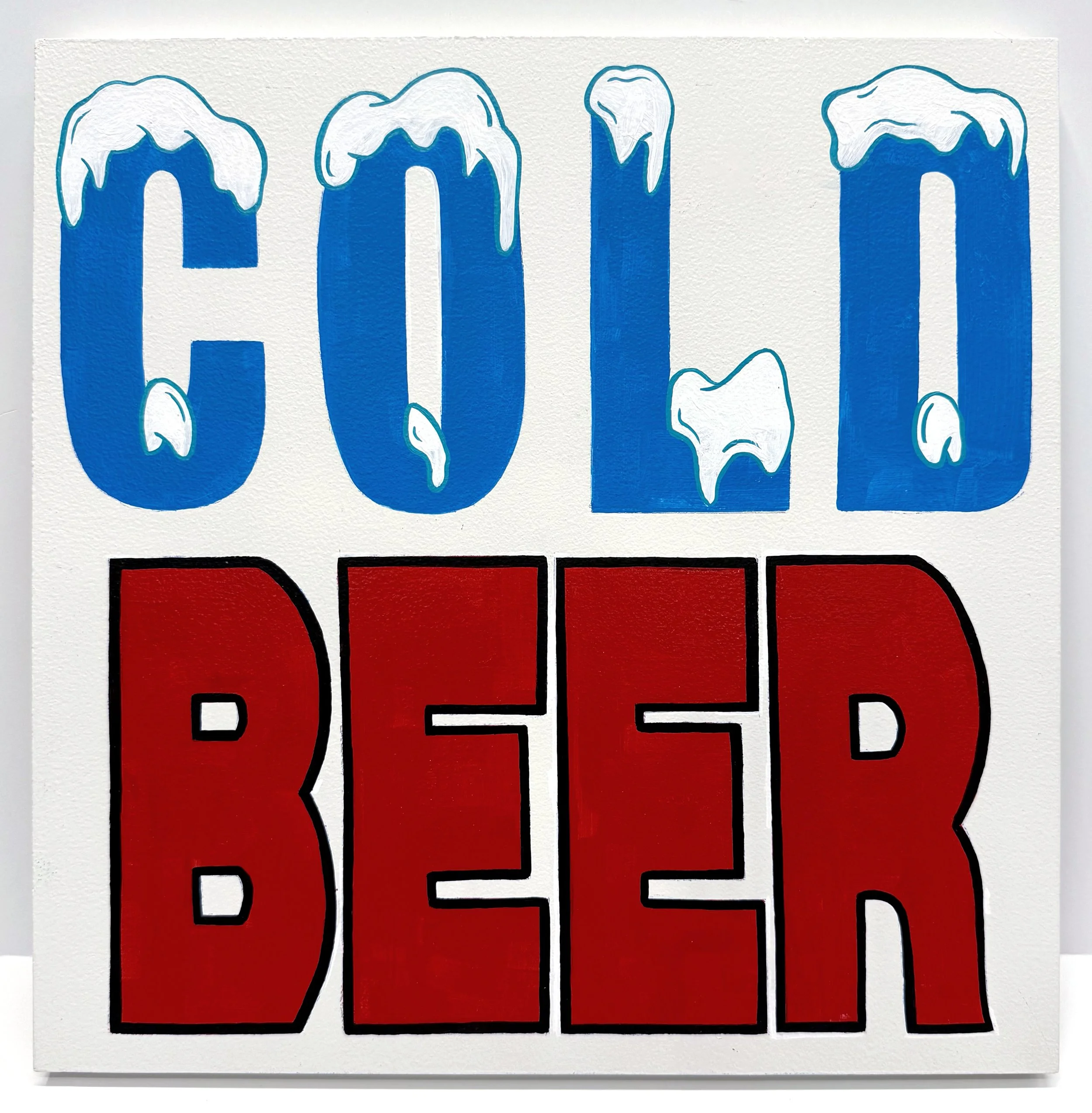 A Cold Beer sign with blue and red lettering