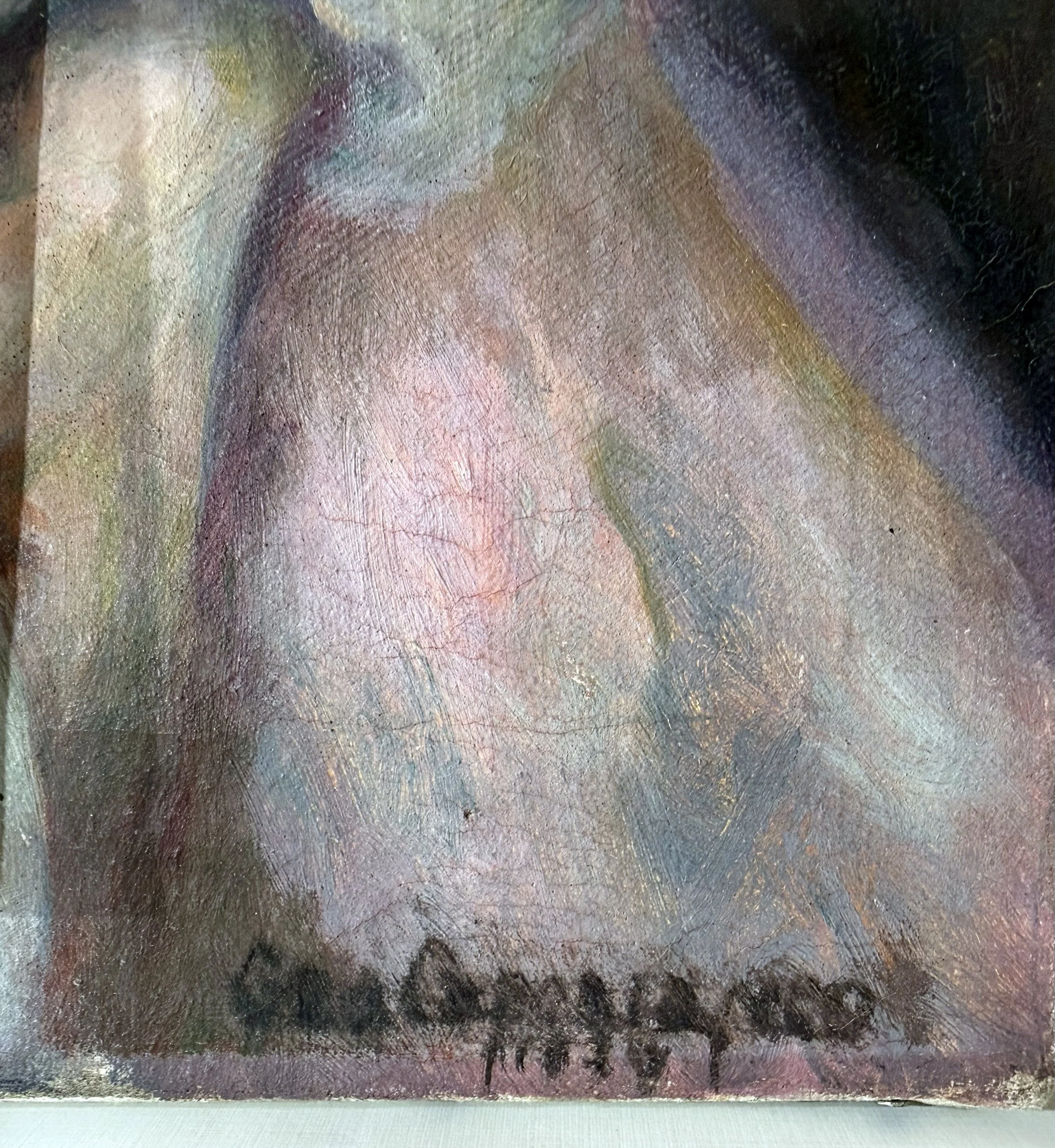 Detail of a smeared artist signature on a painting.