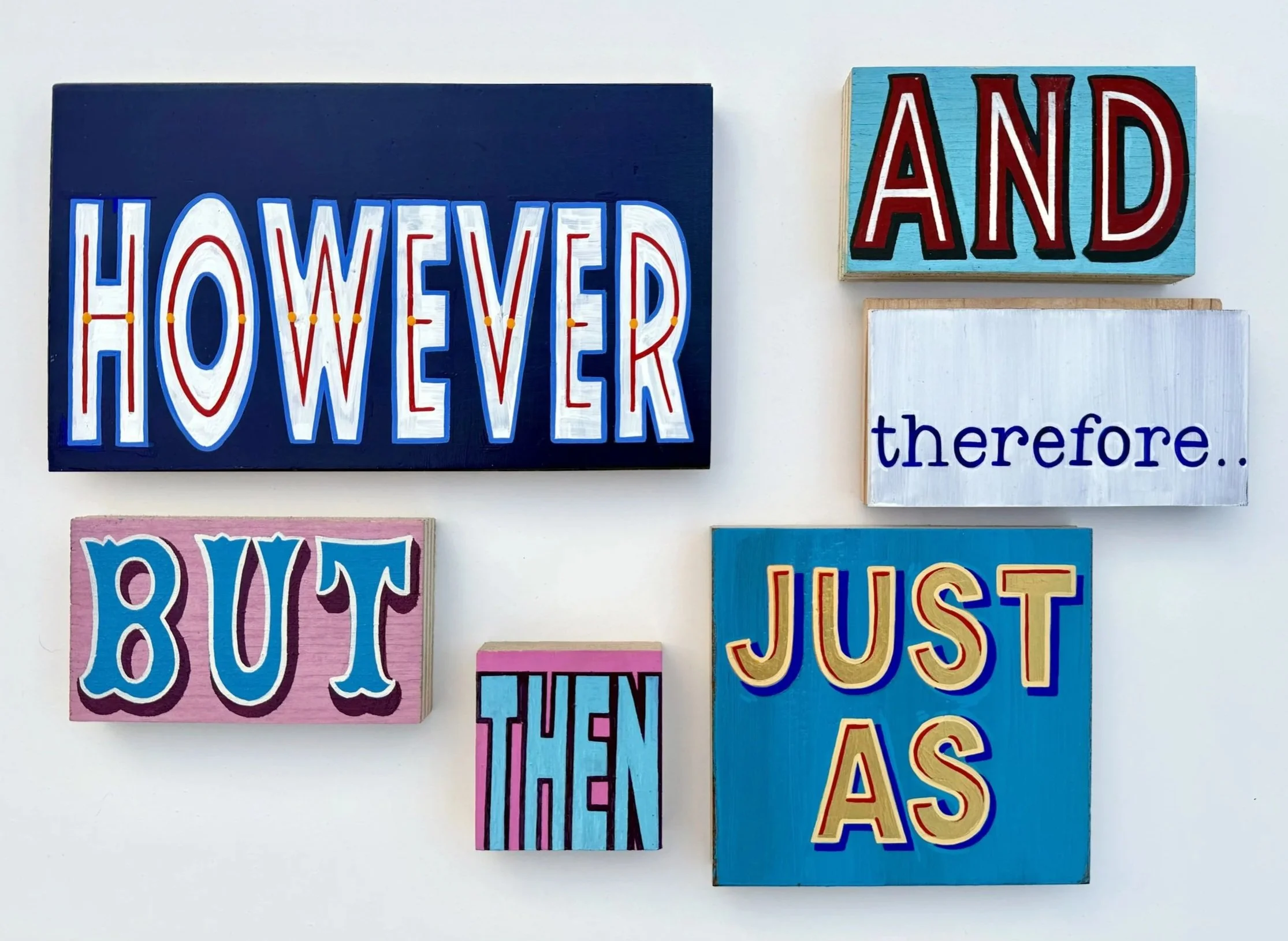 Various conjunction words and phrases painted on wood