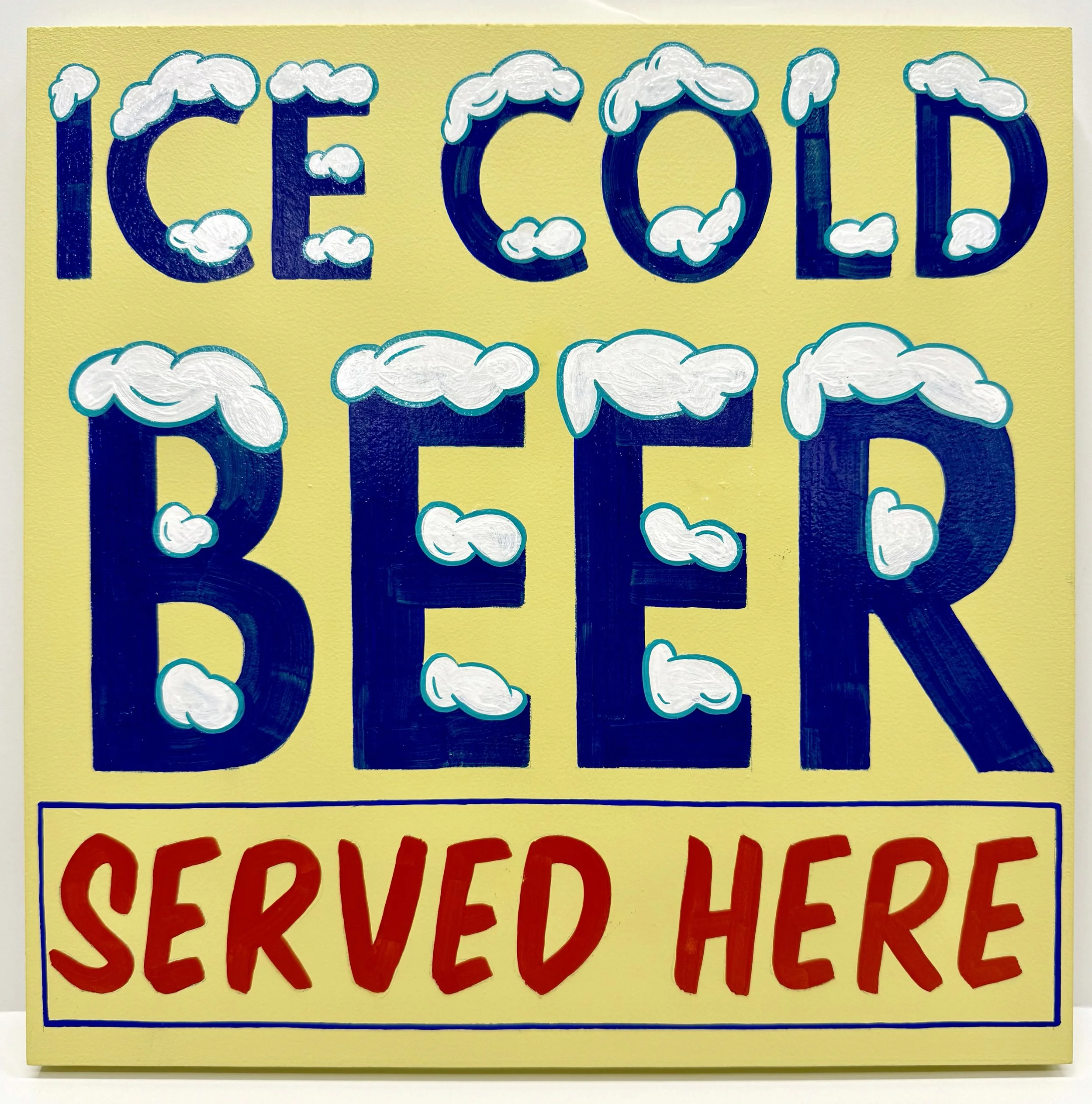 Yellow sign that says Ice Cold Beer Served here with red and blue letters