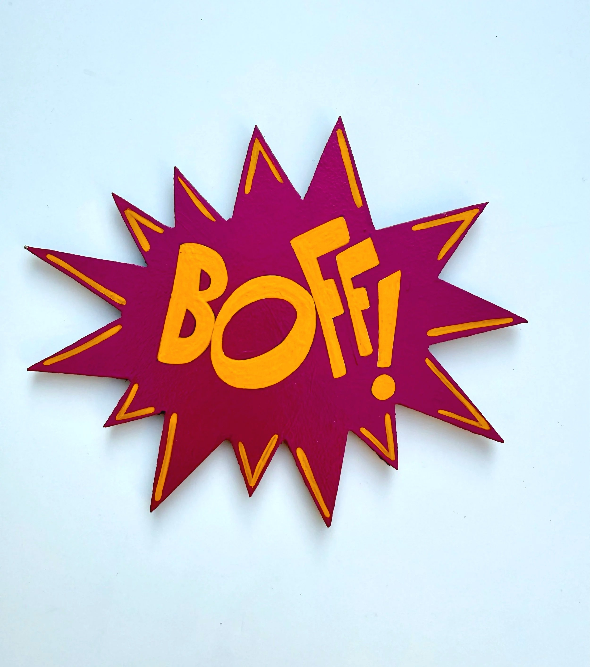 BOFF! painted yellow on a violet burst.