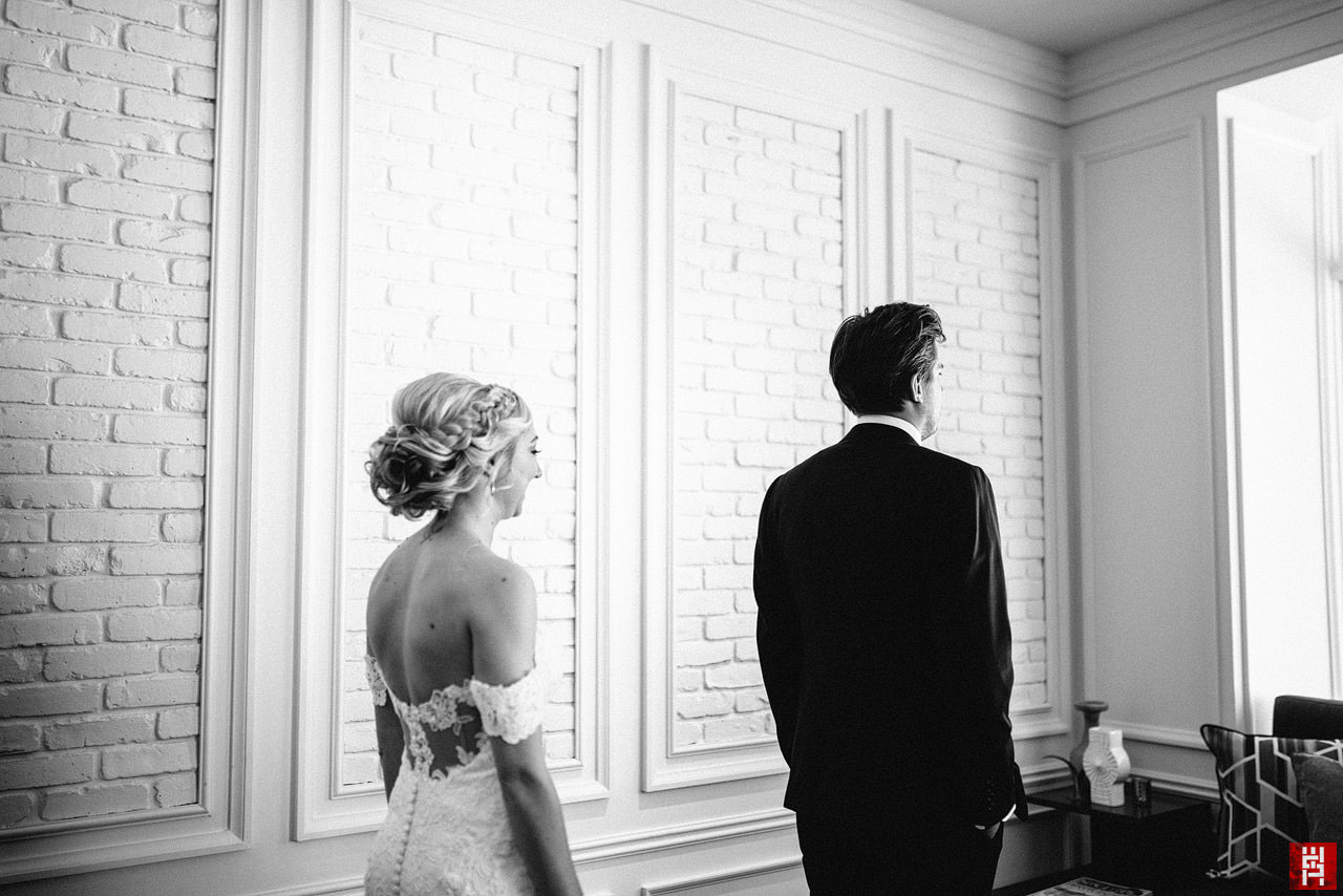 035-bride-groom-first-look-natural-light-indianapolis-le-meridien-hotel-wedding.jpg