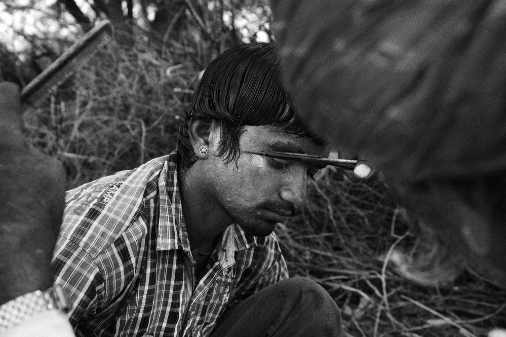 Barber at work. Rajasthan 2012.