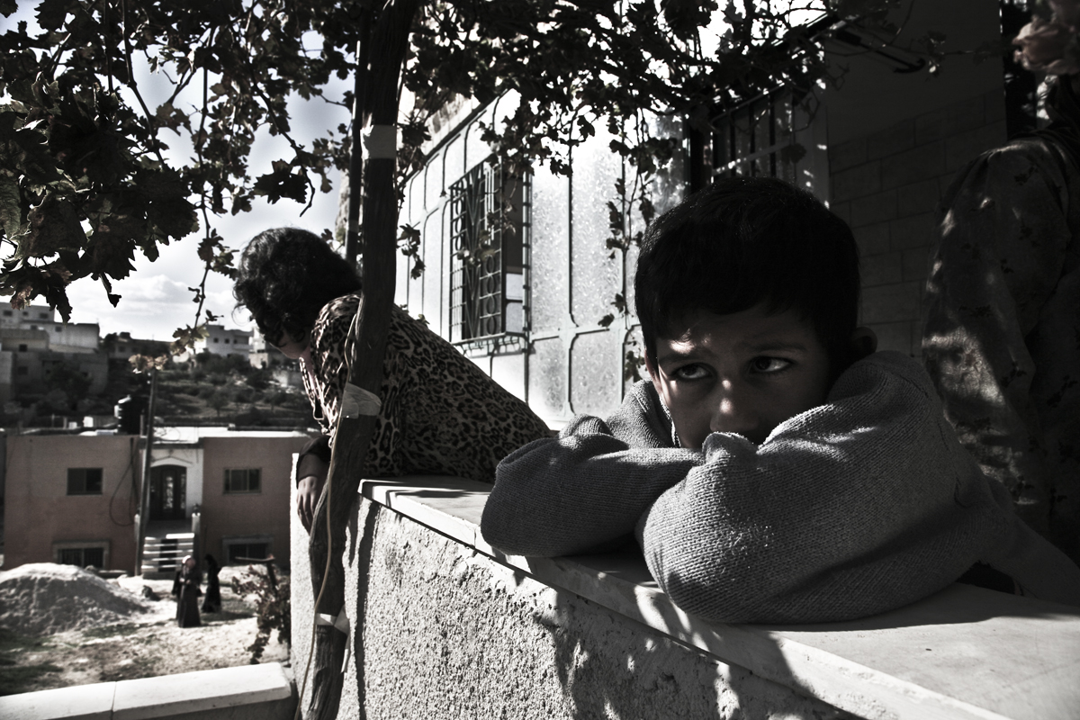 Mousa and his sister Naeemeh at their home in the outskirts of Yatta. Mousa and Naeemeh suffers from mental retardation, their disability percentage is100%. Both of them are students in the special education class in the Information Recourses Disabi