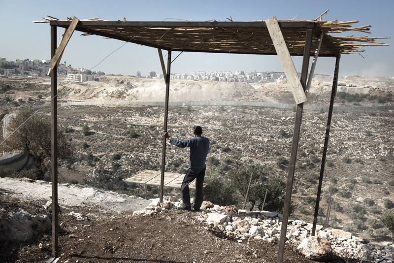 The under construction cafe in the park facing the Israeli Modi'in settlement. UNDP is supporting the construction of a park on the land that is been returned by the Israeli government. Bil'in; West Bank.