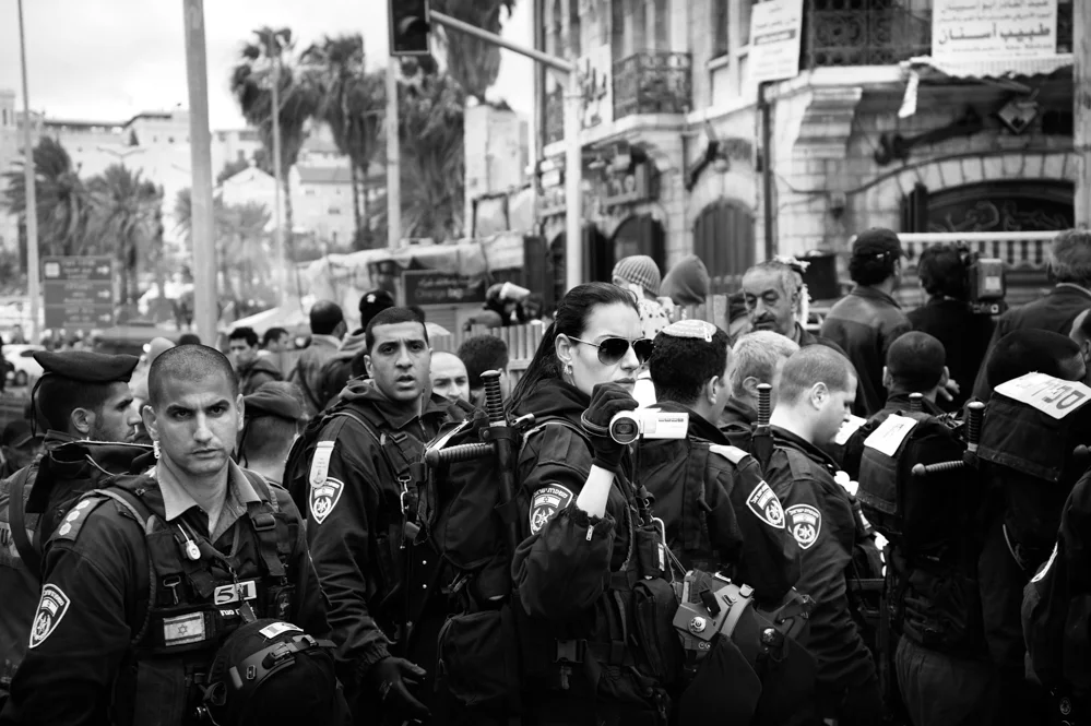  Israeli police force during a Palestinian demonstration at Damascus Gate, Jerusalem. 
