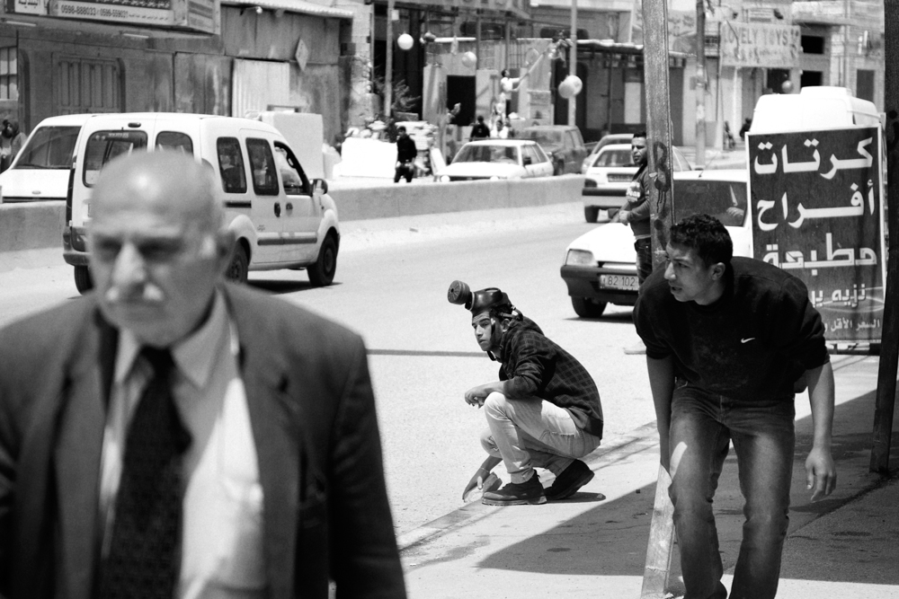  Young Palestinians stone thrower clashes with Israeli Police at Qalandiya checkpoint during the Nakba day commemoration. 