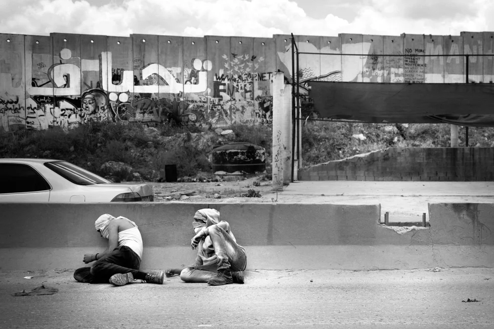  Palestinian demonstrators at Qalandiya checkpoint. 