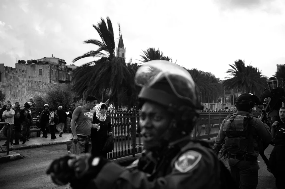  A moment of clashes between Israeli Police and Palestinian during a Palestinian demonstration at Damascus Gate in Jerusalem. 