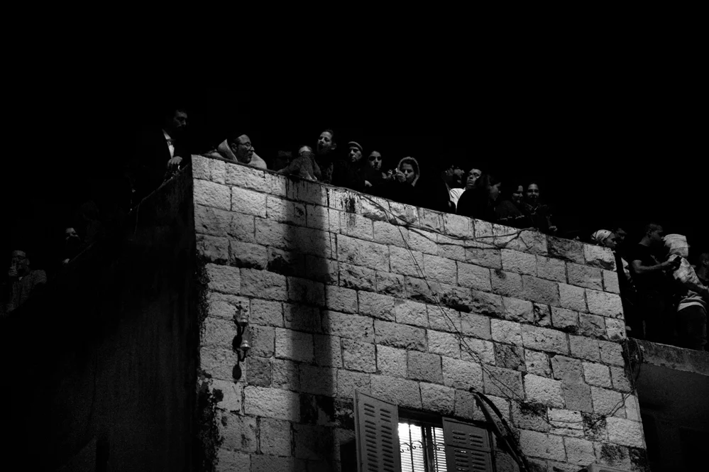  Mourners attend the funeral procession of Rabbi Ovadia, founder of the Shas party. Mea Shearim; Jerusalem. 