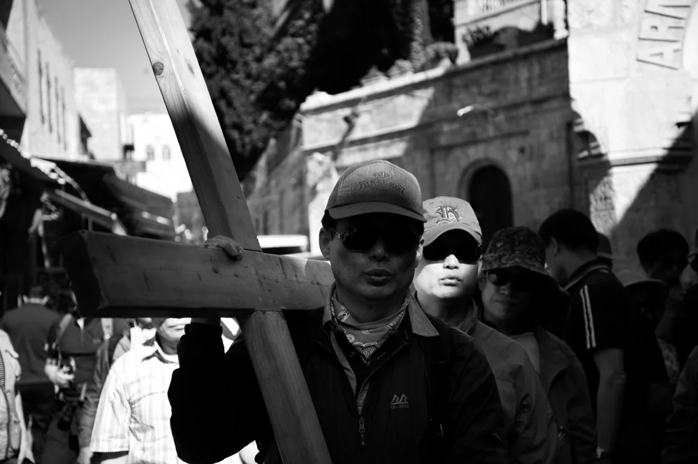 Pilgrims during a Via Crucis on the Via Dolorosa in the old city of Jerusalem. 