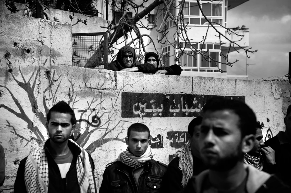  People attend the funeral of Saji Sayel Darwish in his native village of Beitin. Palestinian Territories 11/03/2014 