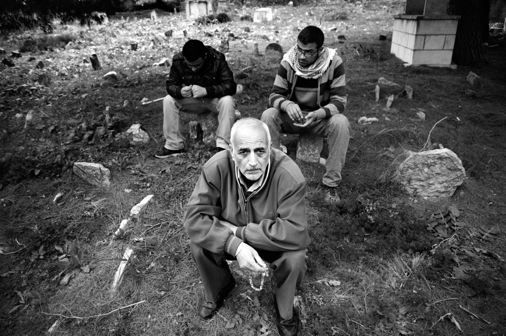  People attend the funeral of Saji Sayel Darwish in the cemetery of Beitin. Saji Sayel Darwish was shoot the night before after supposedly attacking Israeli soldiers on the road to Ramallah. Beitin; Palestinian Territories, 11/03/2014 
