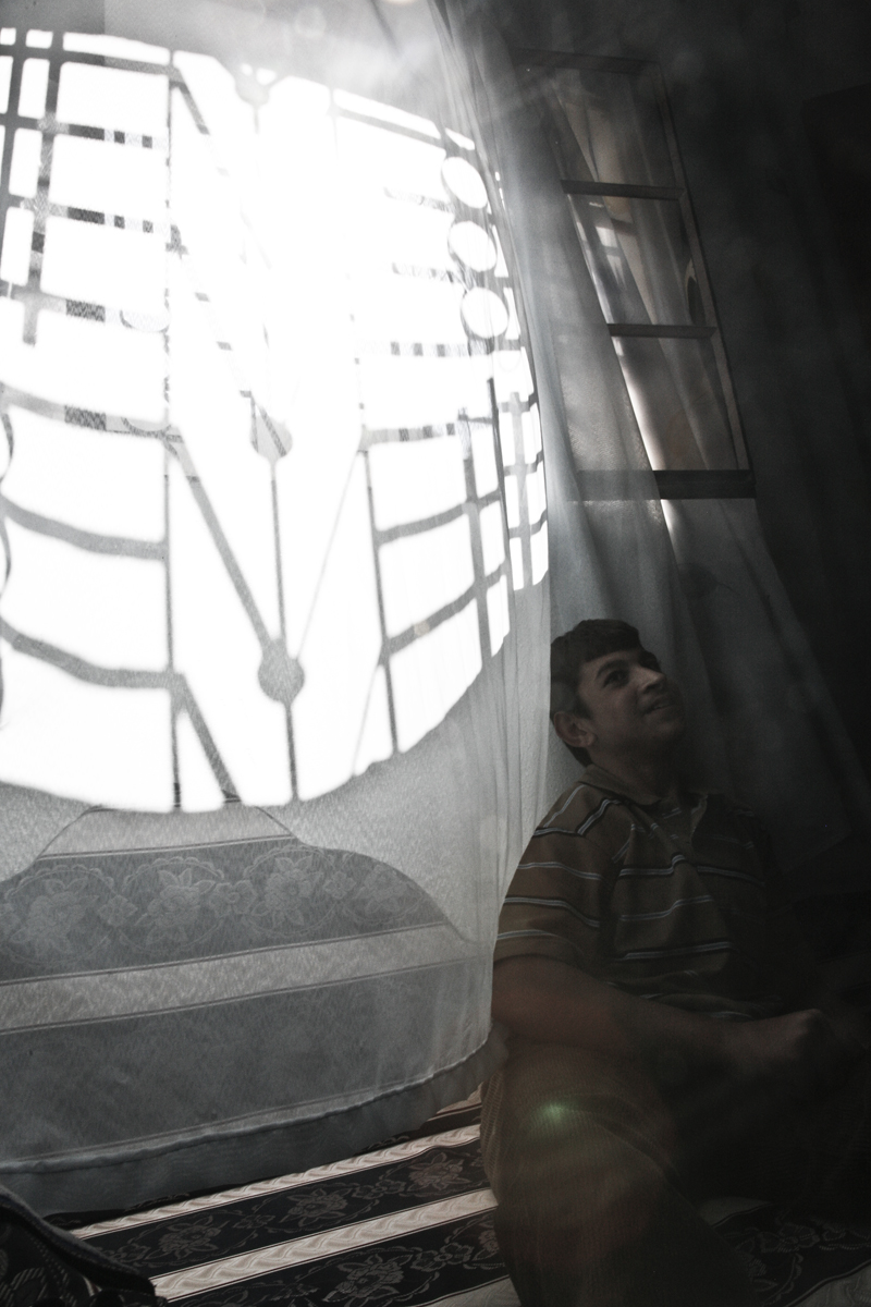 Mohammad at home. He is one of the beneficiary of the educational program for disabled people supported by Handicap International in Yatta, Hebron, occupied Palestinian territory.