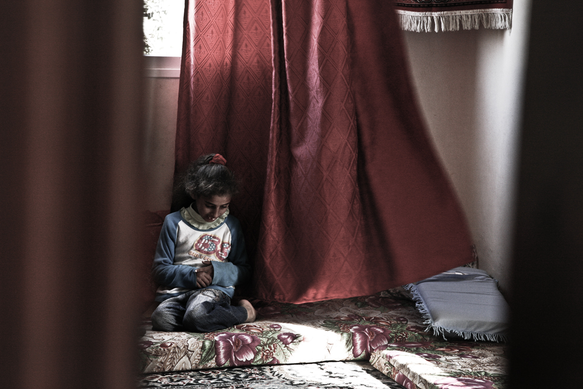 Issa at home. She has limited mental abilities, and is one of the beneficiaries of the educational program for disabled people supported by Handicap International in Yatta, Hebron district, occupied Palestinian territory.