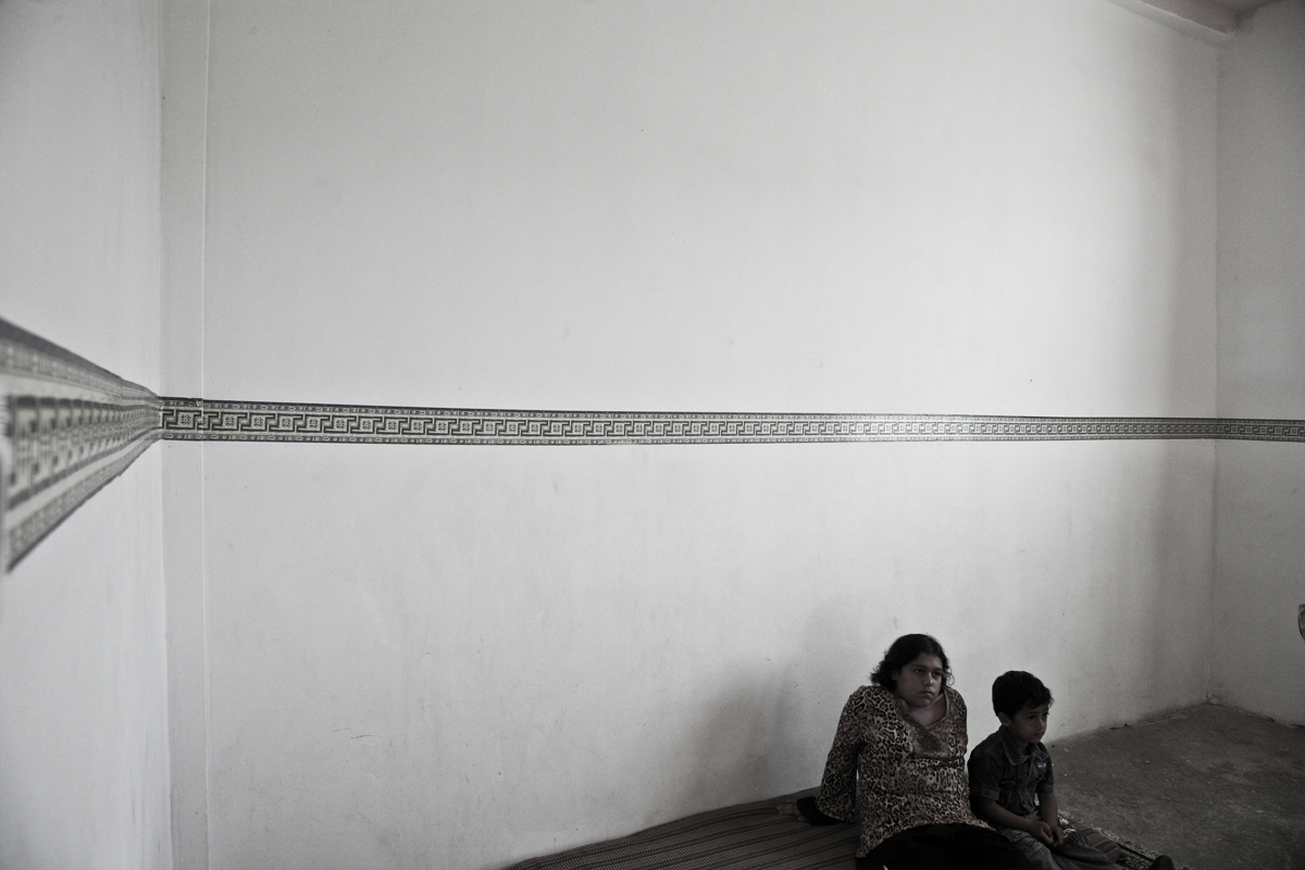 Naeemeh and Mousa at their home. They suffer from severe mental disabilities. Both are students in the special education class, supported by Handicap Intrnational, and held at the Disability Recourse Information Center in Yatta, Hebron, occupaied Pa