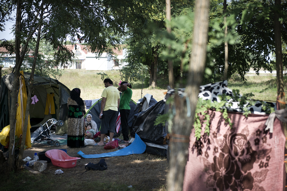 Refugees stay in an informal camp at the Kelebija border crossing waiting to be allowed to cross into Hungary. The Atina mobile outreach team tries to identify the most vulnerable people: women travelling alone or with children. With support of UN W