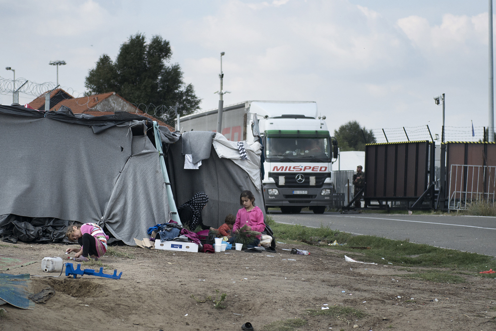 Refugees stay in an informal camp at the Kelebija border crossing waiting to be allowed to cross into Hungary. The Atina mobile outreach team tries to identify the most vulnerable people: women travelling alone or with children. With support of UN W