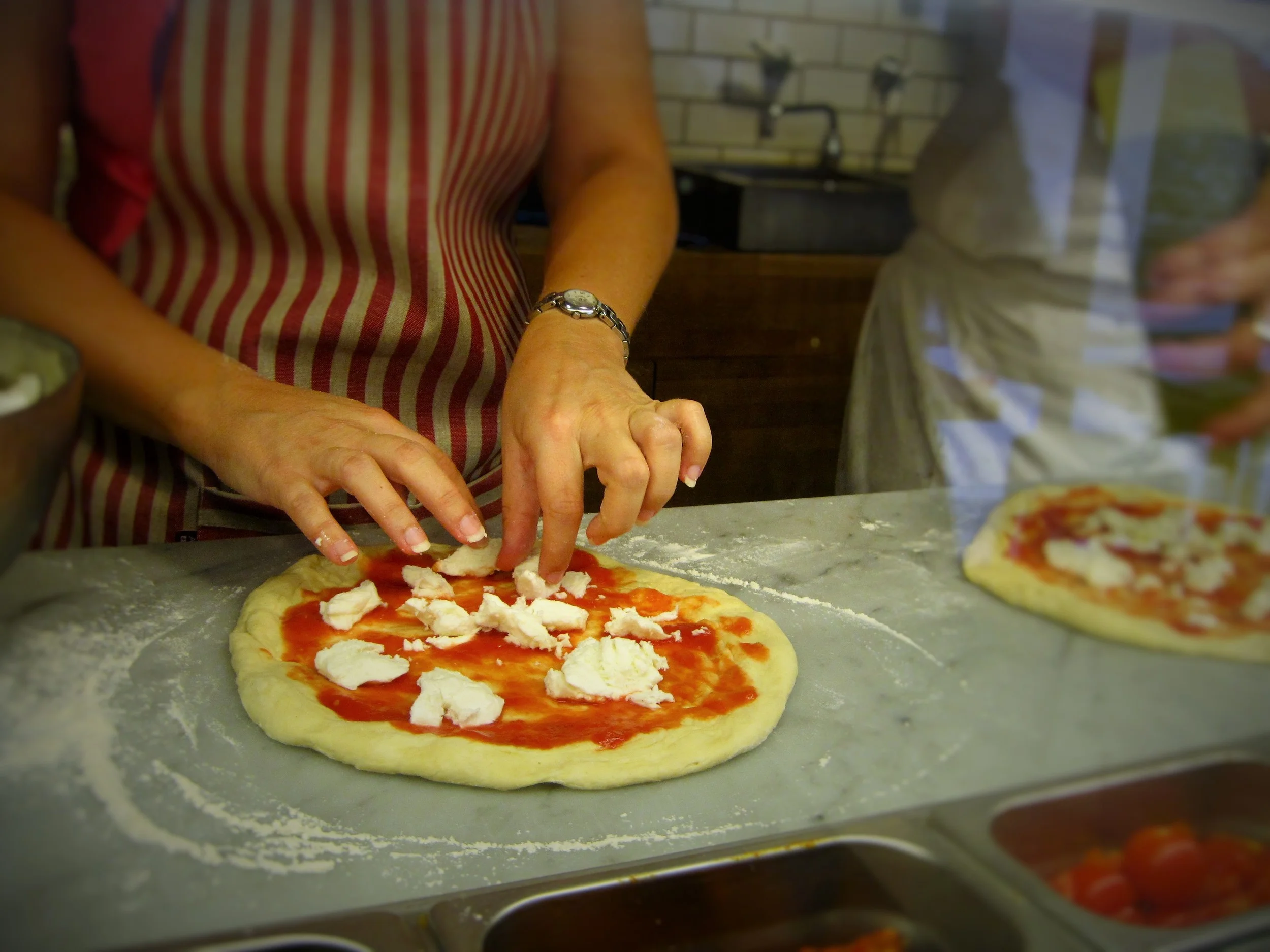 pizza making hands.jpg