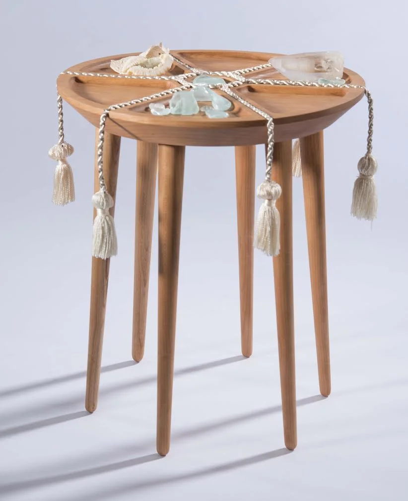  Cherry Wood, CNC Router  This side table was made to display personal treasures found throughout travel and daily life. It is an homage to the Eames interpretation of the american melting pot, shown through their case study #8 house in the Palisades