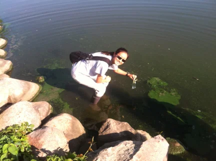 Sylvia sampling a bloom of Aphanizomenon in Silver Lake, Iowa.