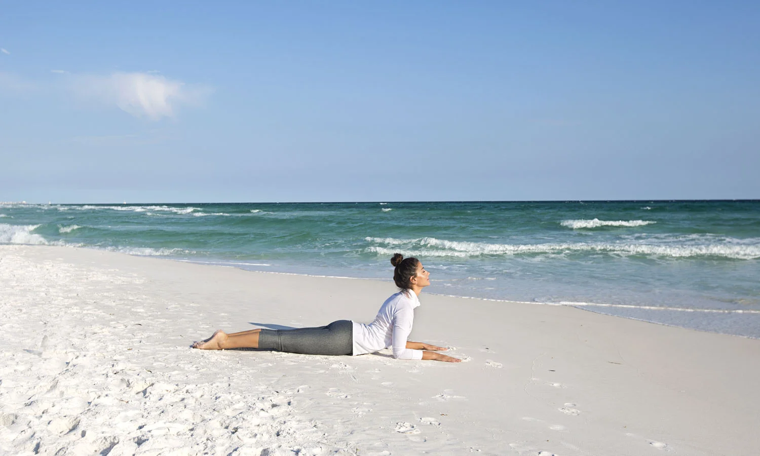 Lay on tummy and forearms. Shine the heart forward as you root down with forearms and hands