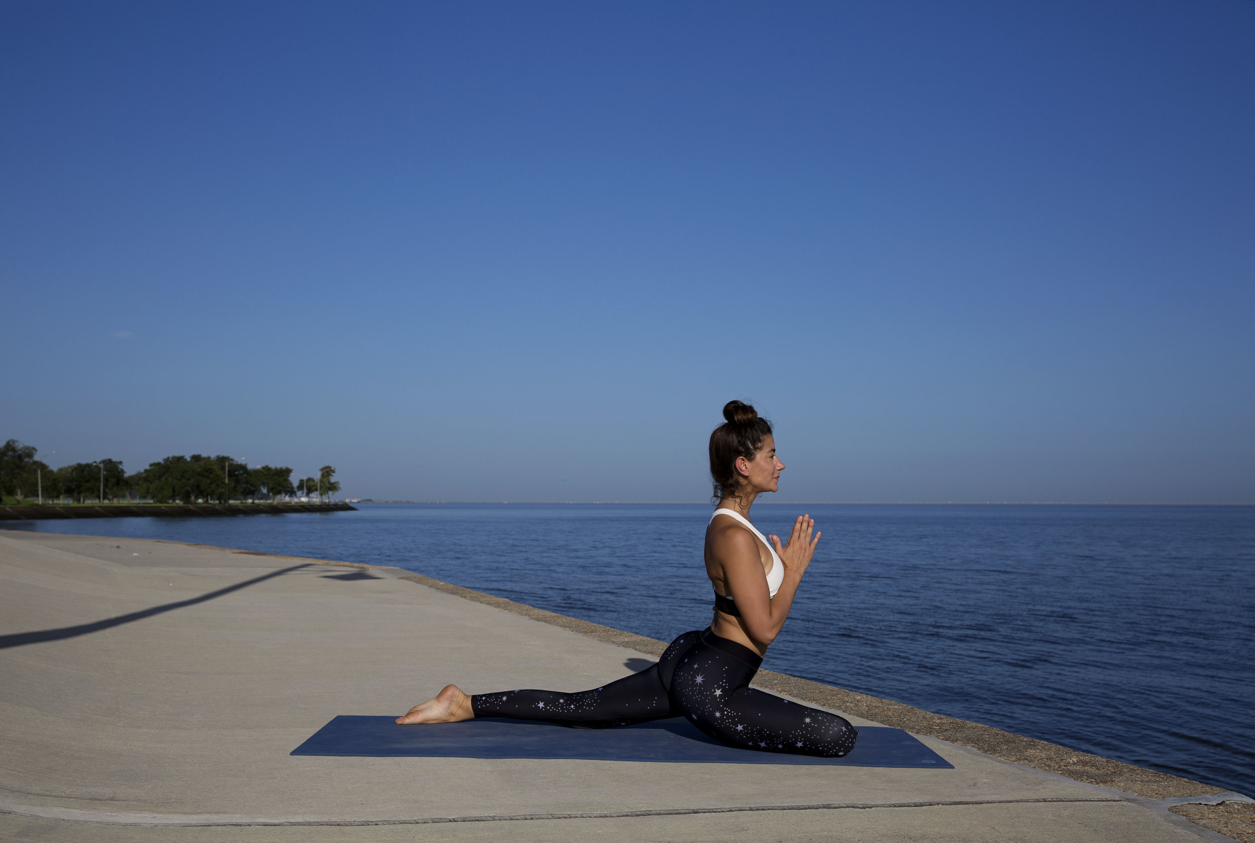 Bent leg foot is flexed. Take the hands off the ground and into prayer to root down and stabalize that strength. 