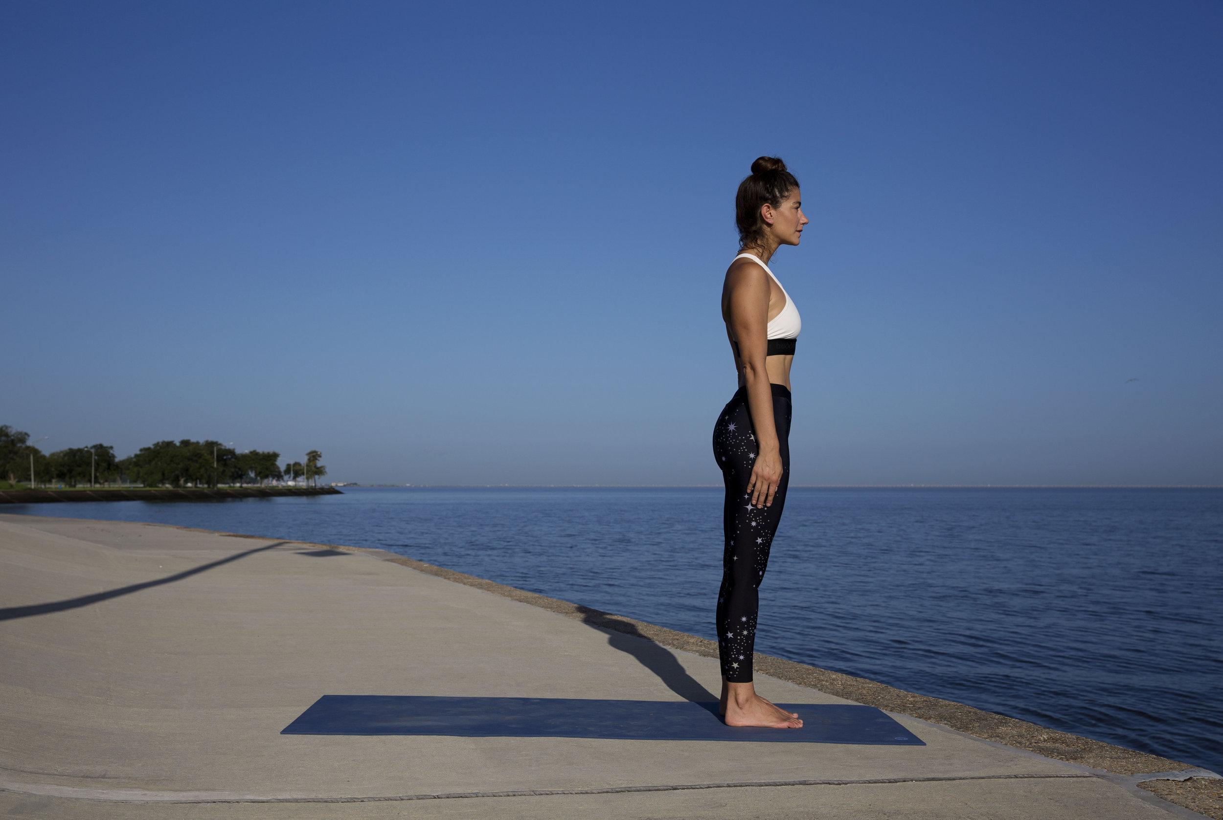 After sun salutations, find your way back to standing pose. 