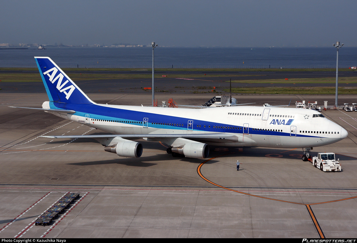 JA8961 - All Nippon Airlines Radio Panel, Autobrake panel, rudder trim, cabin interphone and pedestal panels, overhead panels