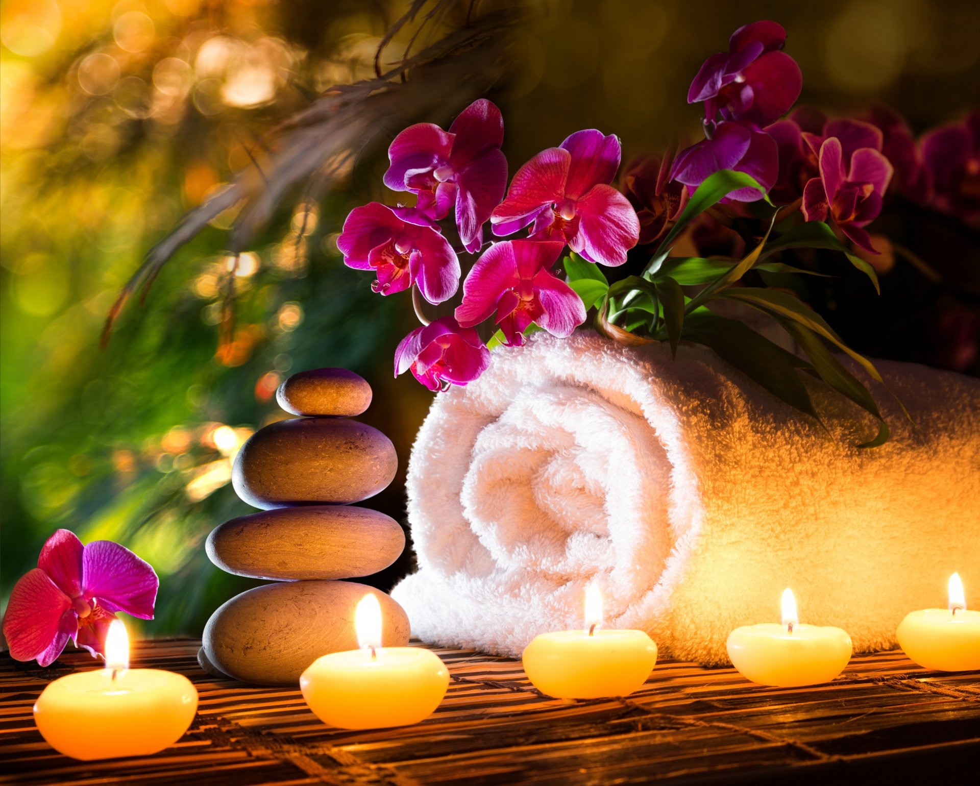 towel-spa-stones-candles-flower-orchid.jpg