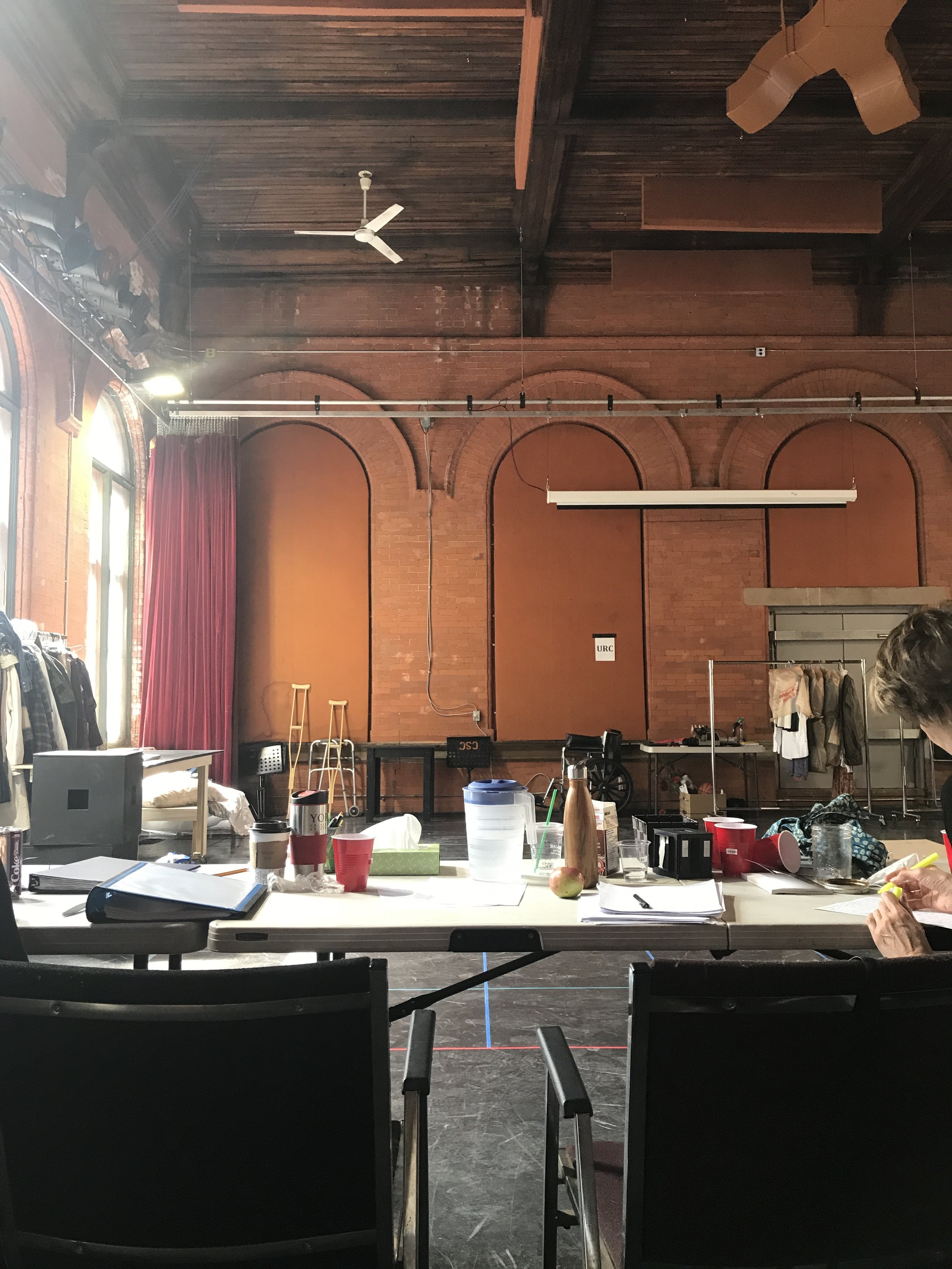  CanStage rehearsal hall, with a glimpse of Maggie Huculak.  