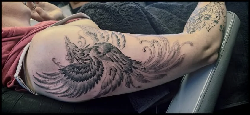 Black and Grey Feather Tattoo