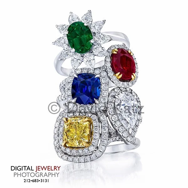 Let's start Monday out right, with a knock out stack ring photo. #stackrings #yellowdiamondring #rubyring #ringstack #haloring #emeraldring