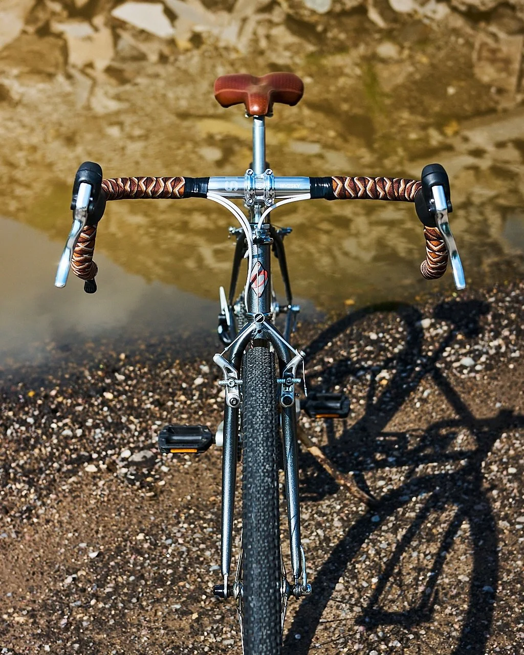 1996 Diamondback Approach 

Another hybrid turned gravel ripper for my pal Casey. 

Notable parts:
Whiskey bars 
Rattler bar tape by @camp.and.go.slow 
Tektro brake levers 
1x7 friction shifting
Adventure components crankset 
38t narrow wide chainrin