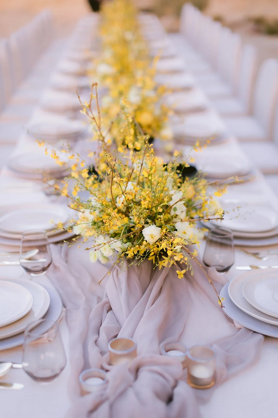 Desert floral centerpiece in taupe and yellow, Amangiri wedding