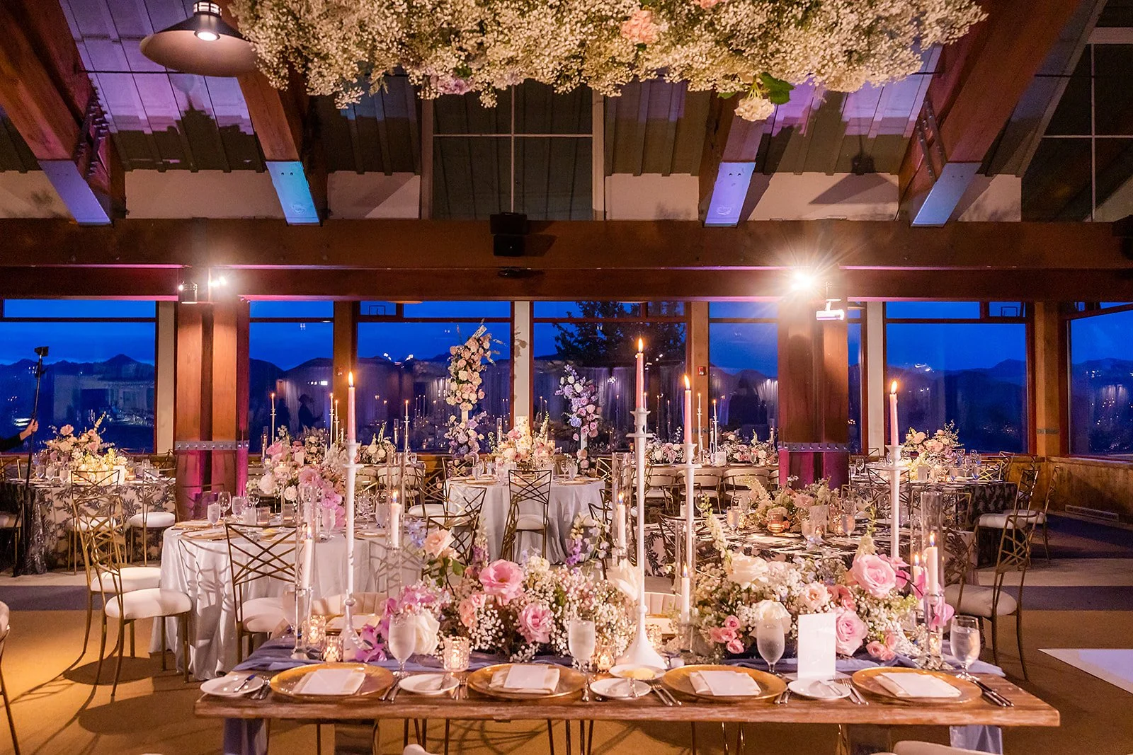 Tall taper candles and dramatic floral for Little Nell Sundeck