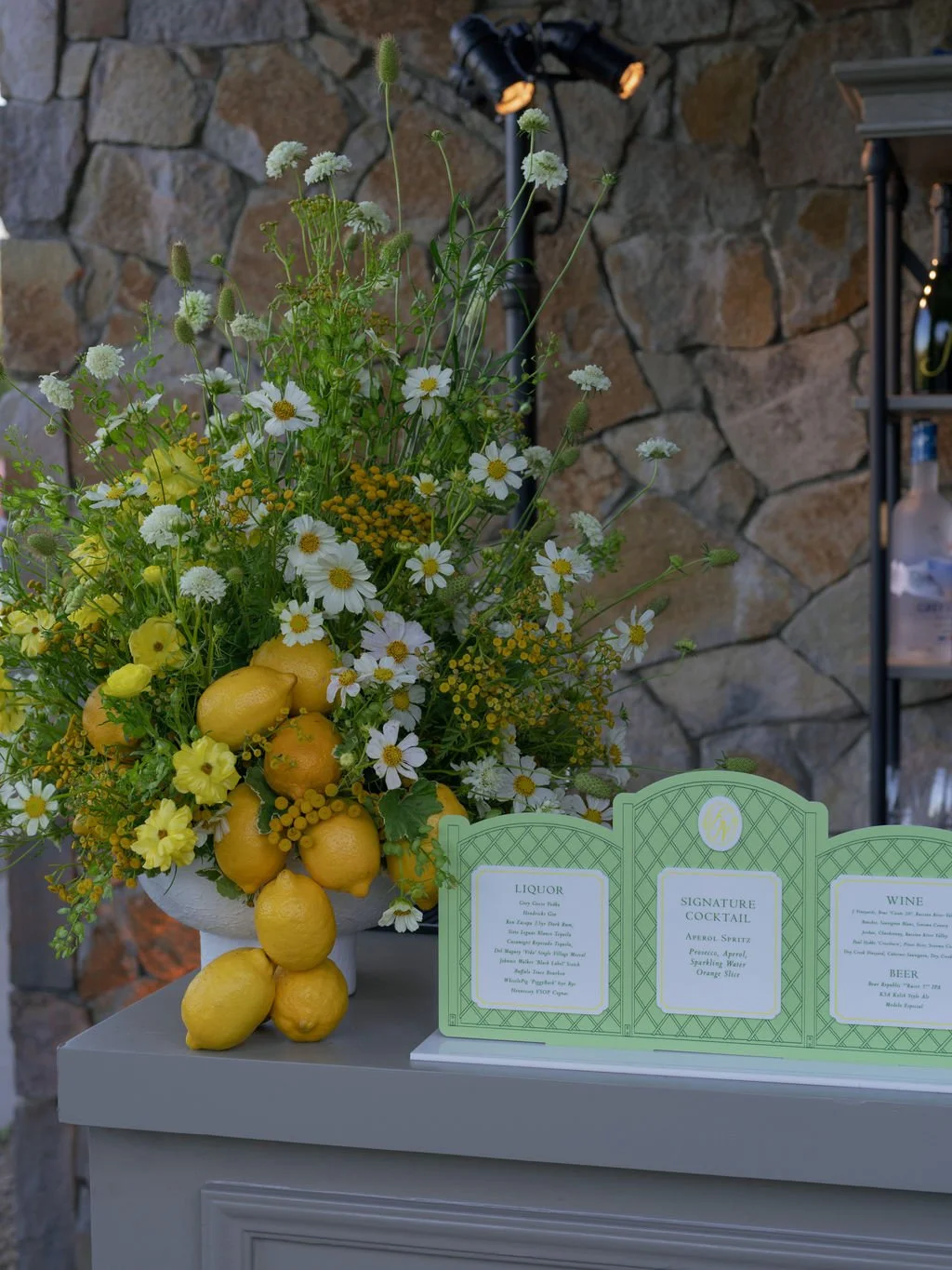 Lemon centerpiece for Italian themed welcome party and Bar signage 