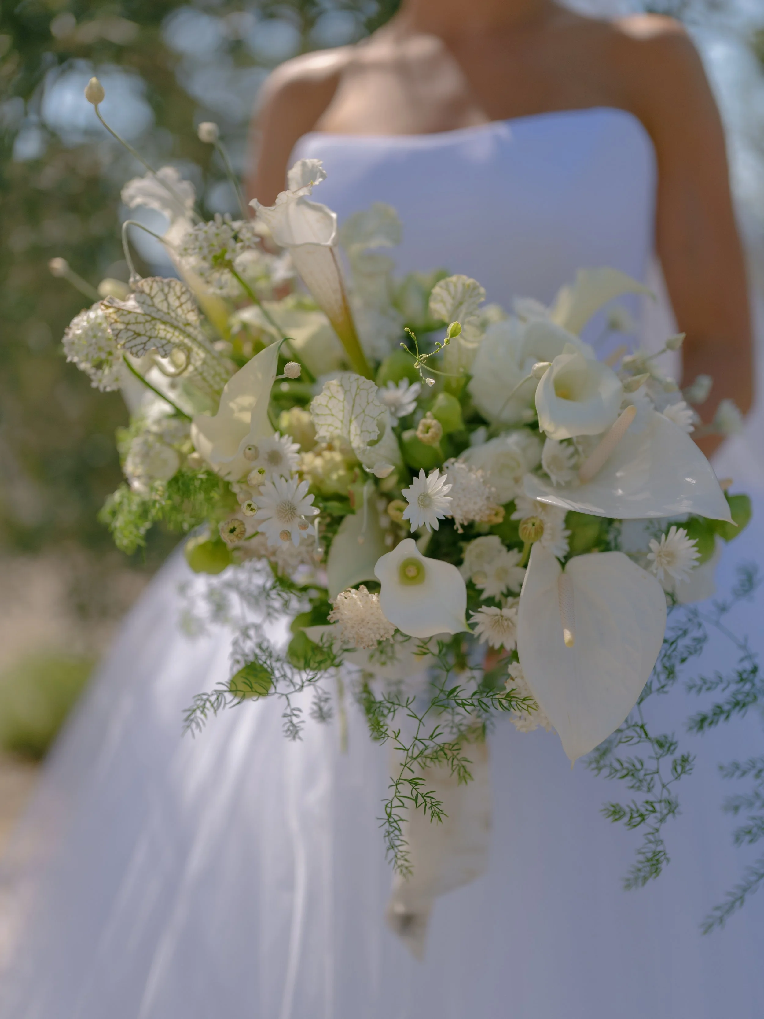 White calla lily and anthurium bridal bouquet