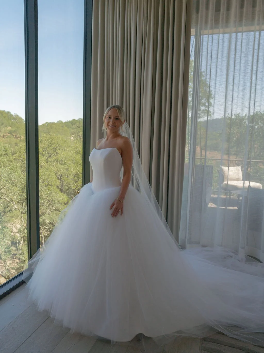 Bridal portrait in a ball gown and cathedral veil at Montage Healdsburg